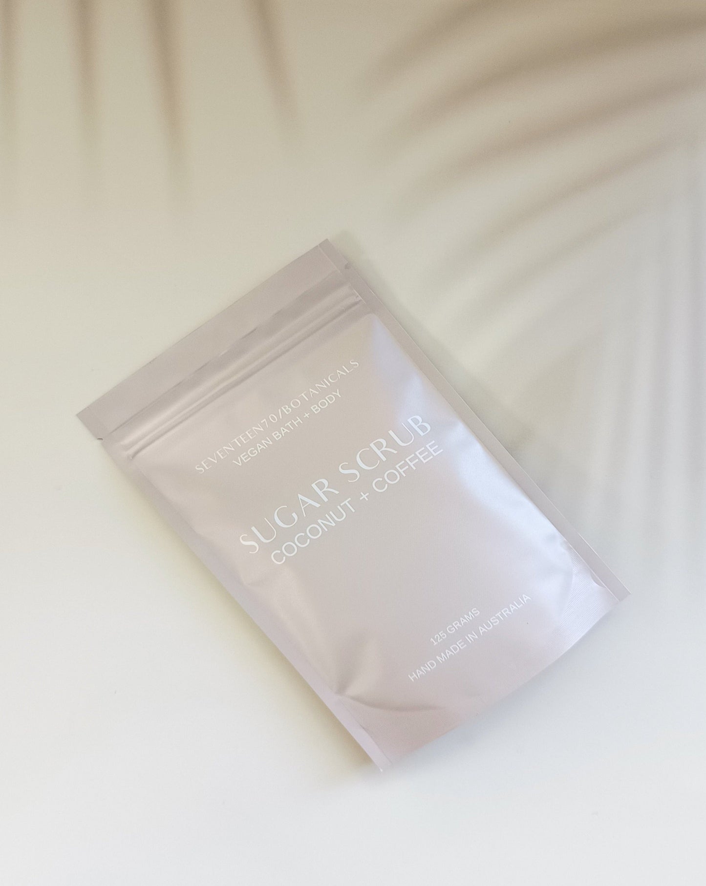 Sugar scrub packaging on a white background