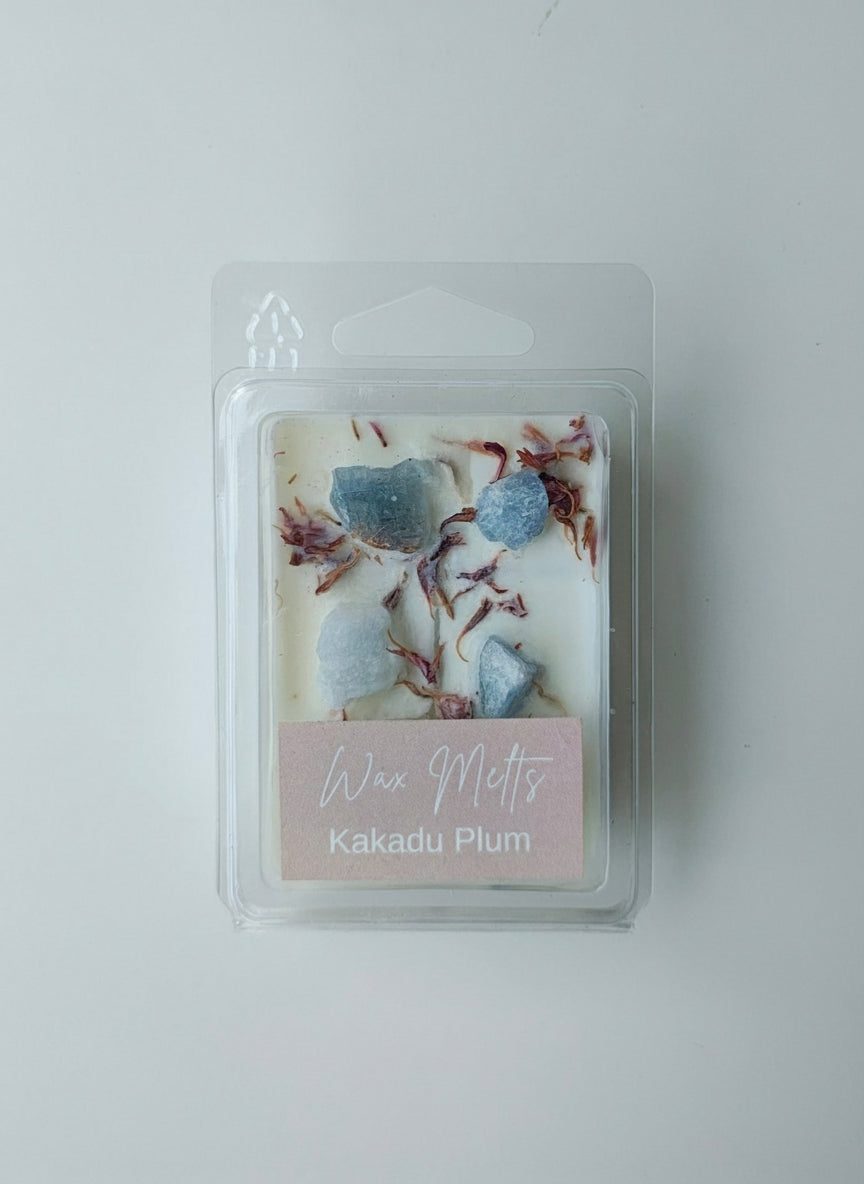 Wax melt in a clear packaging on a white background