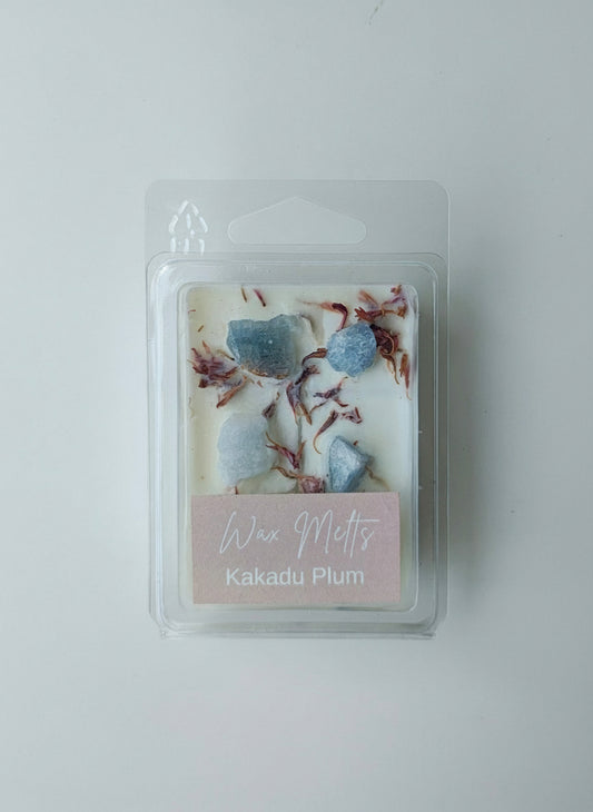 Wax melt in a clear packaging on a white background