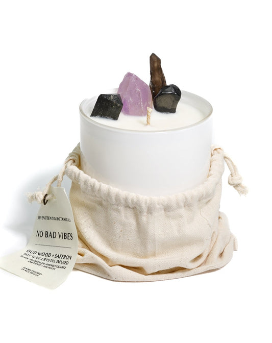 black oud scented soy candle no bad vibes