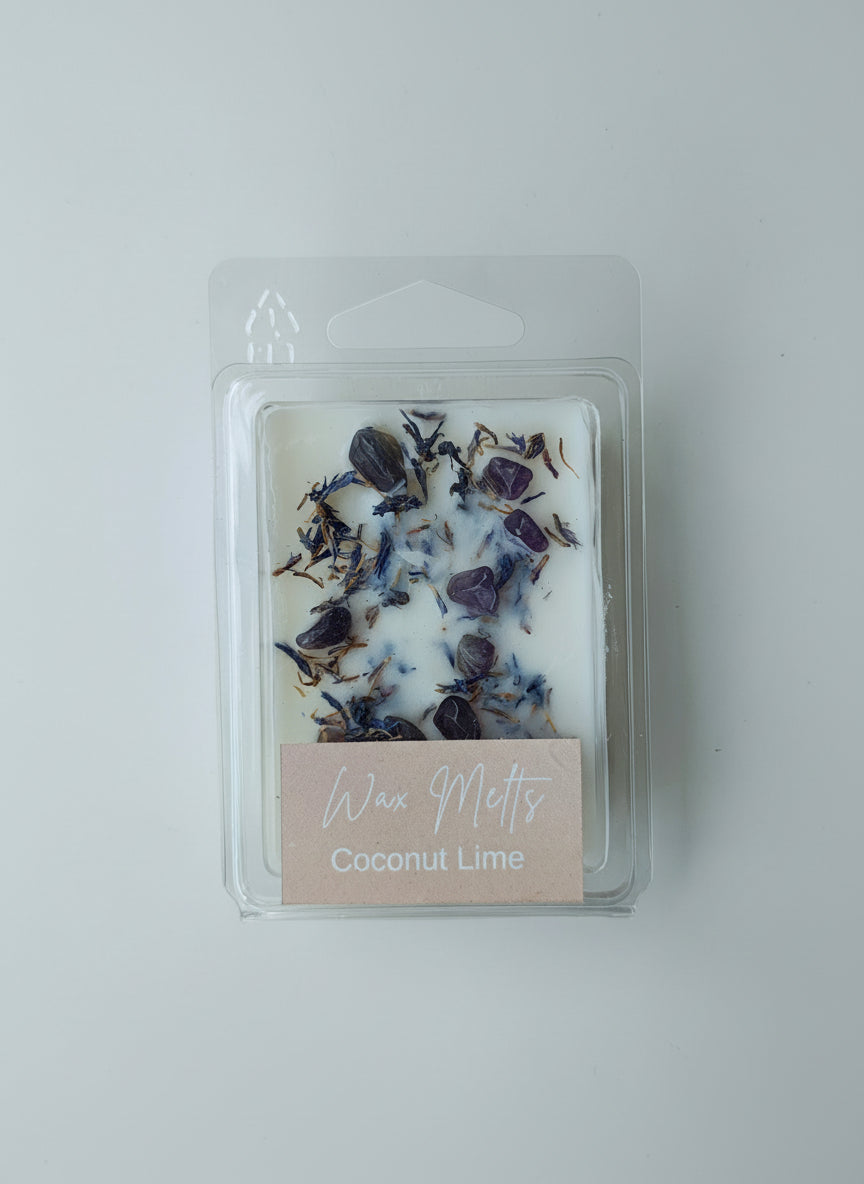 Candle in a clear packaging with a label on a white background